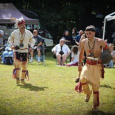 People dancing at powwow