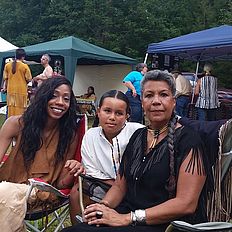 People enjoying the powwow