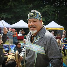 Person smiling at powwow